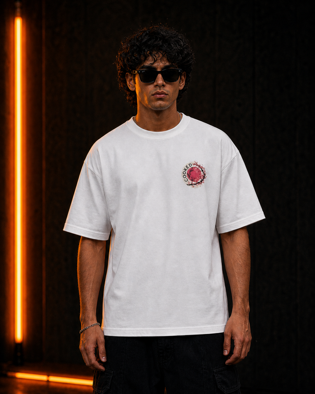 Katana oversized white tee front with left-chest crest, on model